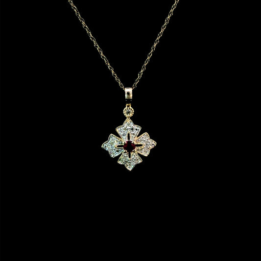 165960 - .18 ctw ruby and diamond pendant