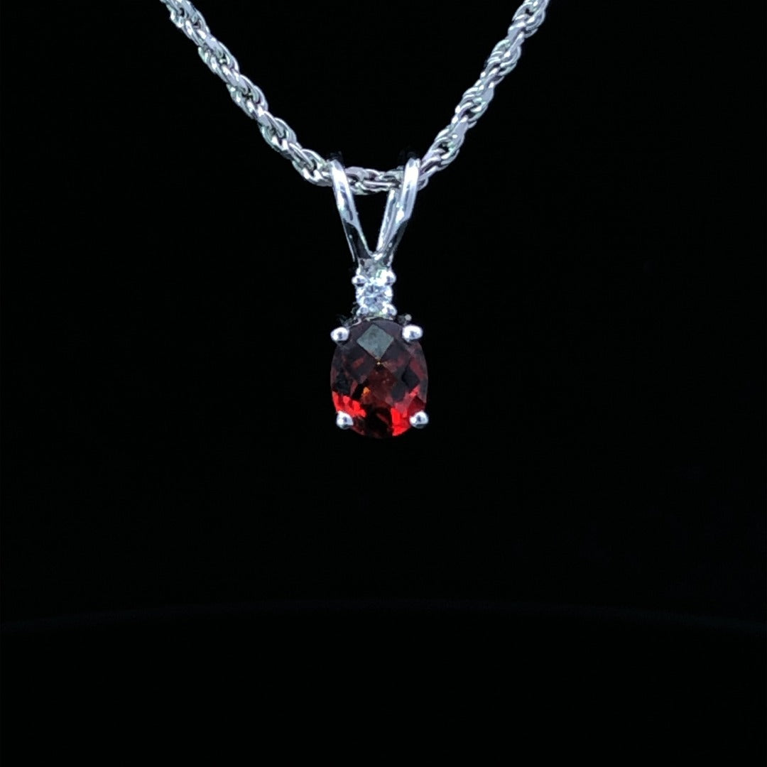 Garnet and diamond pendant