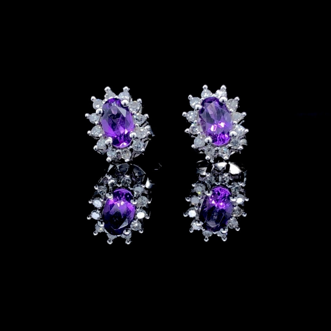 .66 ctw amethyst and diamond earrings