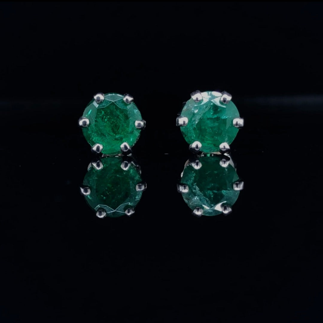 1.60 ctw emerald earrings