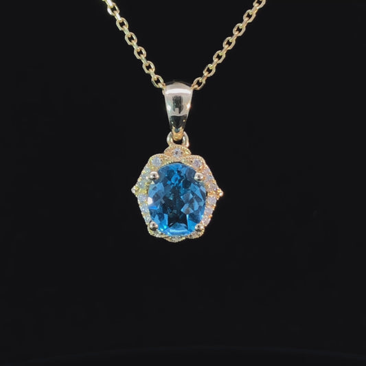 1.78 ctw blue topaz and diamond pendant