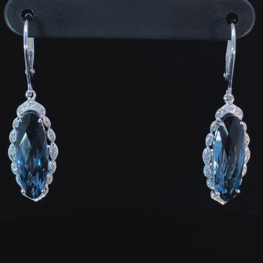 7.56 ctw blue topaz and diamond earrings