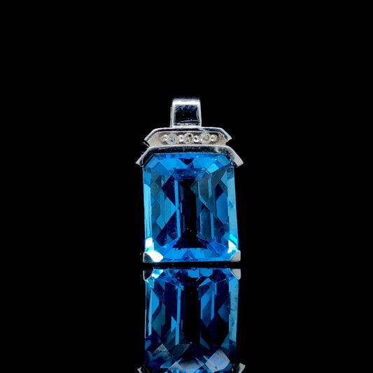 Blue topaz and diamond pendant