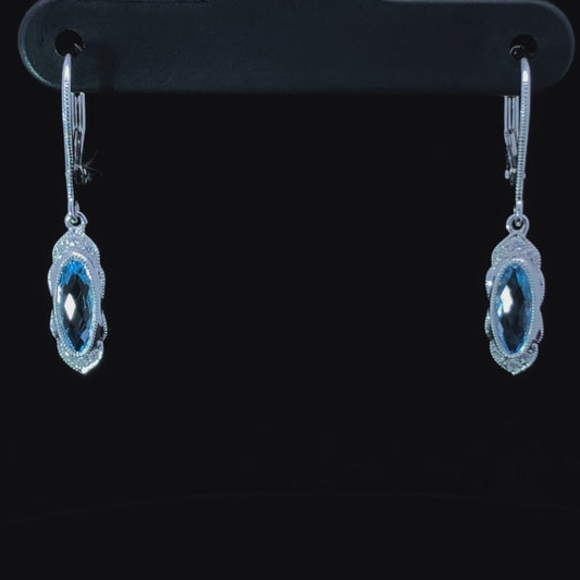 1.03 ctw blue topaz and diamond earrings