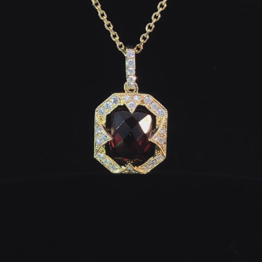 2.23 ctw diamond and garnet pendant