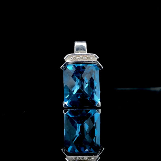 Blue Topaz and Diamond pendant