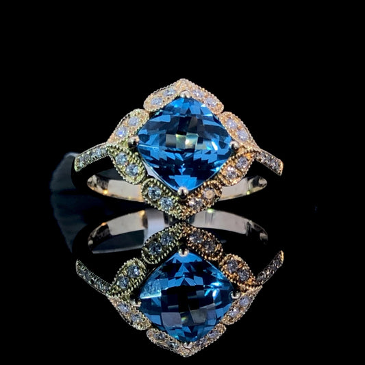 160113 - 1.96 ctw blue topaz and diamond ring