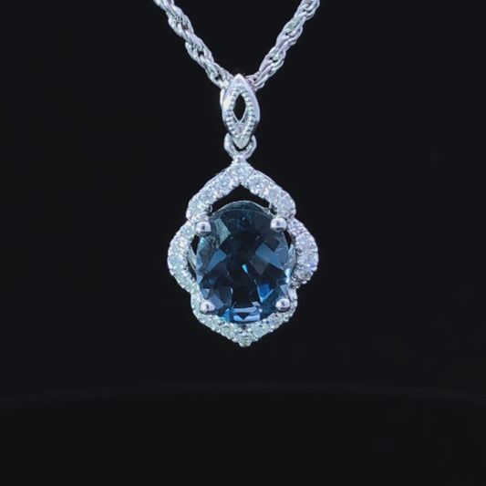 1.34 ctw diamond and blue topaz pendant