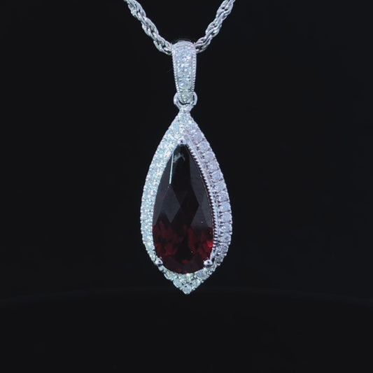 3.19 ctw garnet and diamond pendant